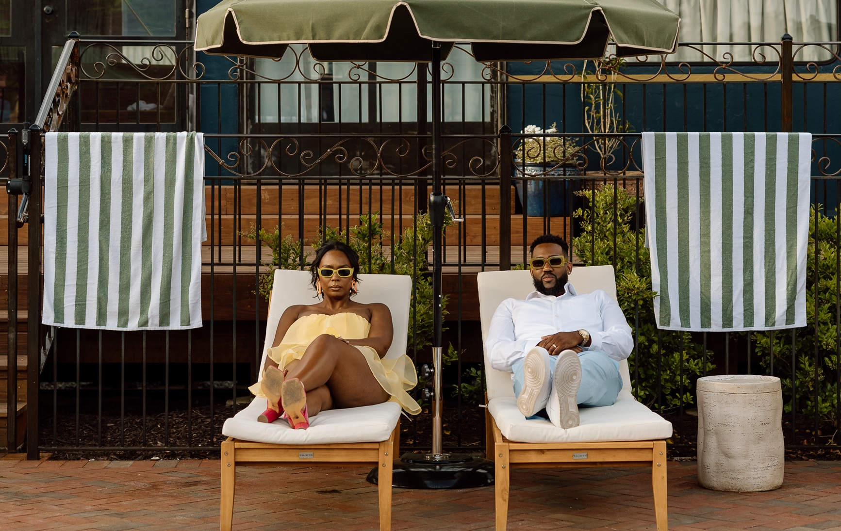 Lightroom Social Exports-2692 Couple under an umbrella by the pool